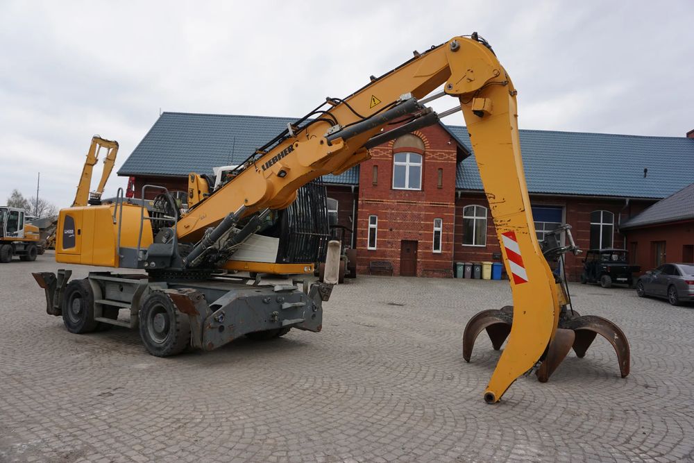 Liebherr Lh 22 m litronic + chwytak 2013