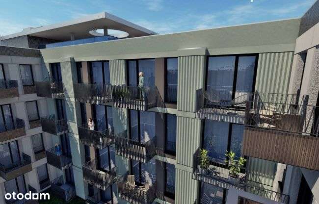 Lokal inwestycyjny na Jeżycach, widok na zielone patio - Pełny obrazek: 3/9