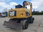 Caterpillar M313D - 6