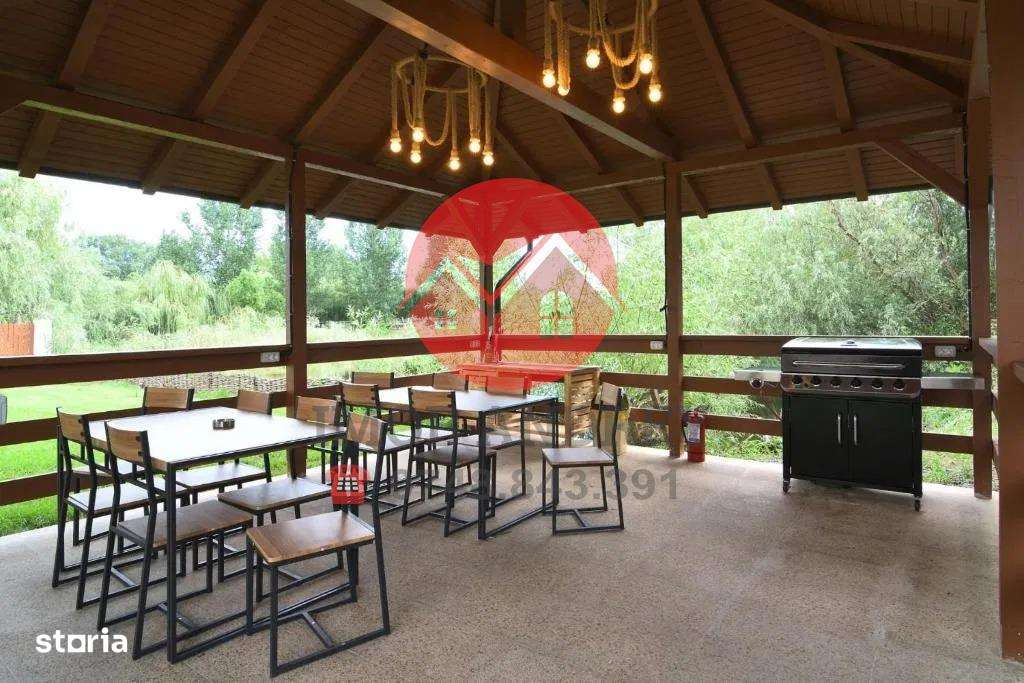 Pensiune moderna in Delta Dunarii, ponton si iaz privat pentru turism - Imagine principală: 3/19