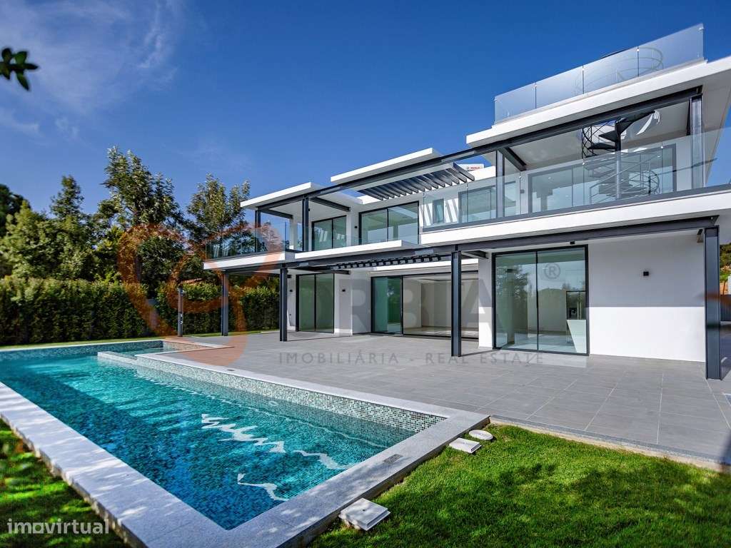 Fantástica moradia V4 com piscina e garagem em zona privilegiada - Grande imagem: 5/52