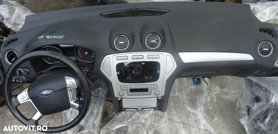 Plansa de bord Ford Mondeo din 2010 cu airbag volan si pasager volan pe stanga - 1