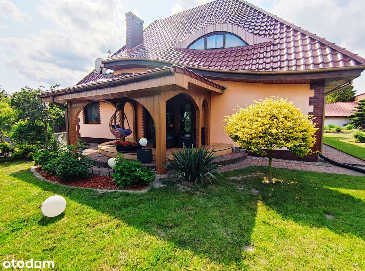 Oszczędny w eksploatacji dom, dwa garaże, duża zagospodarowana działka-5