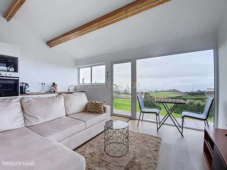 Moradia Totalmente Renovada com 2 Apartamentos T1 e Vista Mar na Algar - Grande imagem: 5/32