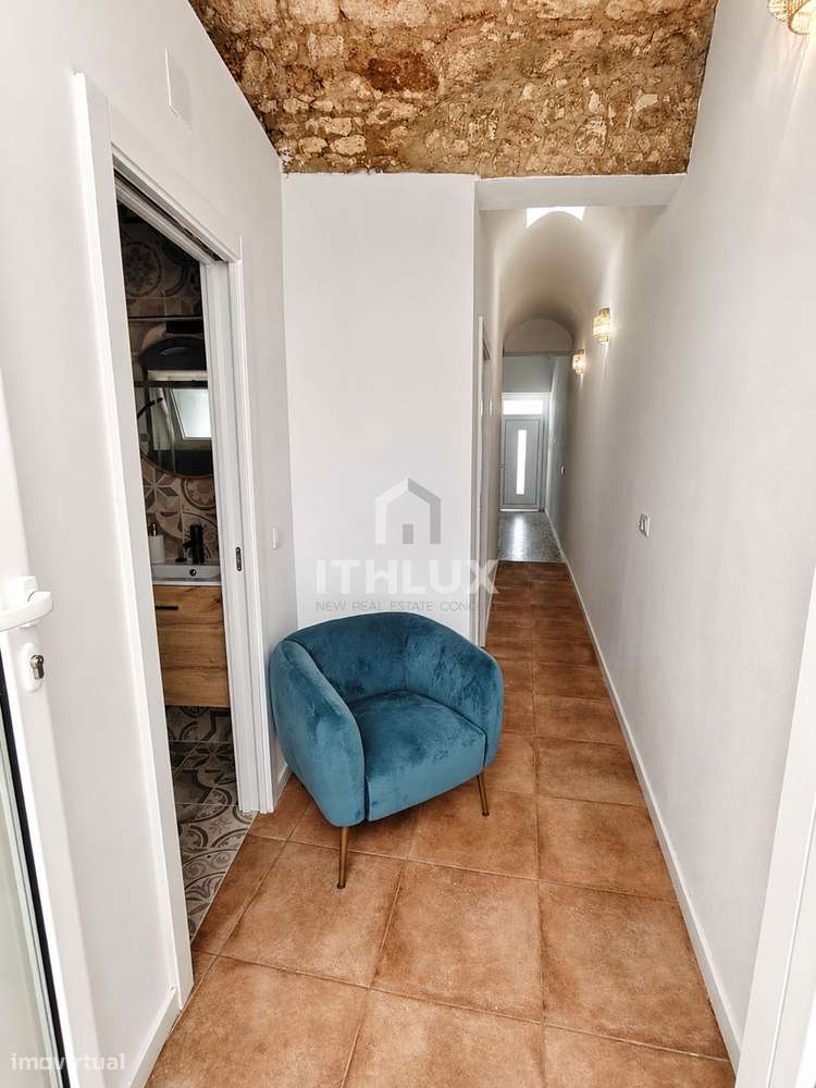 Moradia T1 renovada com açoteia na Baixa Histórica de Olhão-9
