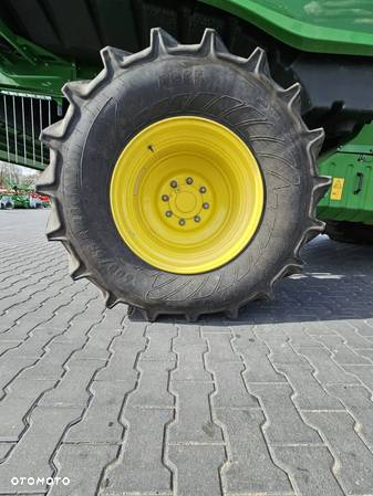 John Deere T670 - 7