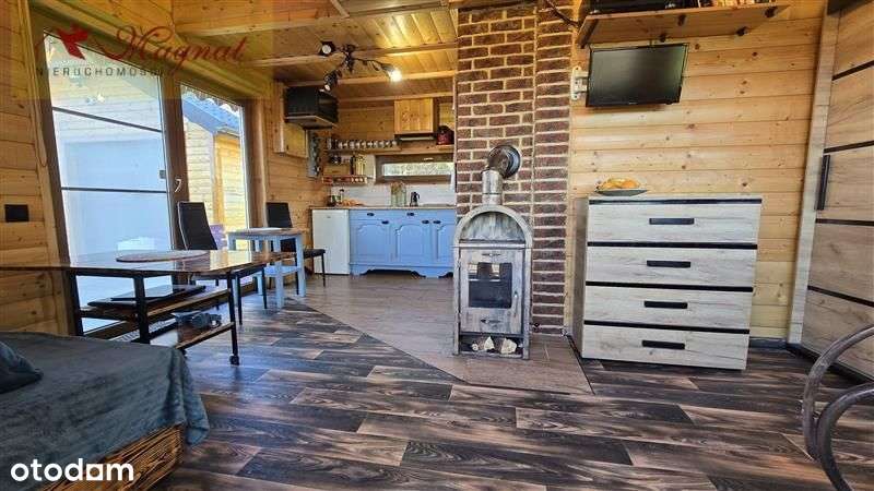 Atrakcyjny dom drewniany całoroczny na dużej dział-6