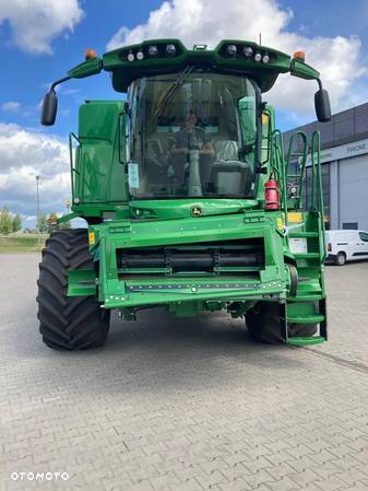 John Deere T670 - 13