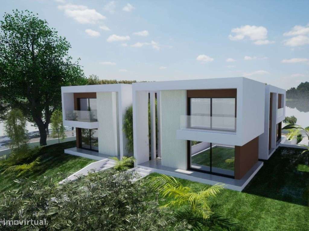 Moradia geminada T4+1 com vista sobre o Rio Sado em Tróia - Grande imagem: 2/46