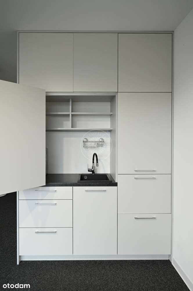 Kawalerka z ogródkiem + miejsce parkingowe!-4