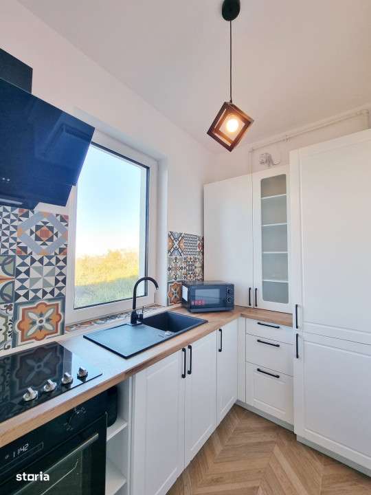 Apartament amenajat special cu parcare acoperita si priveliste catre a-9