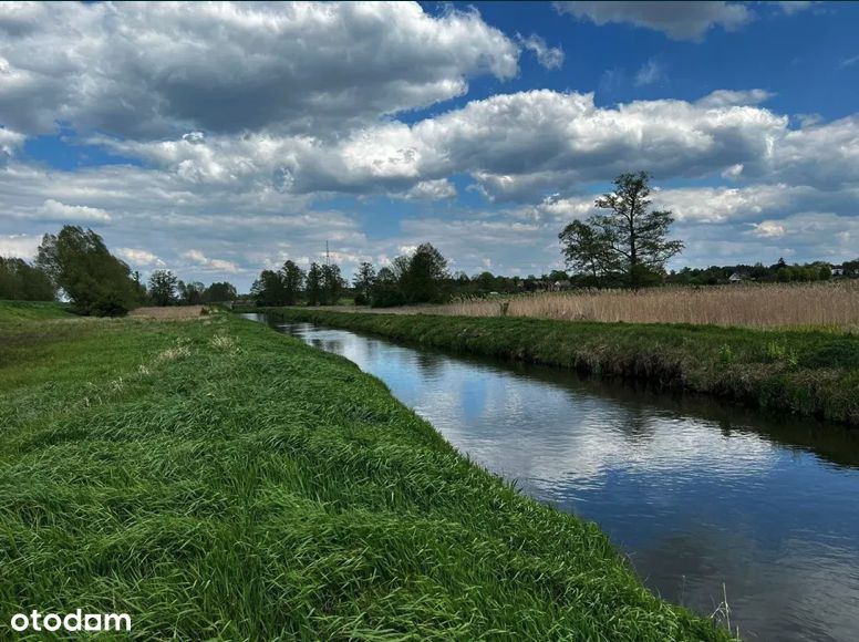 Działka przy rzece (500 m. linii brzegowej)