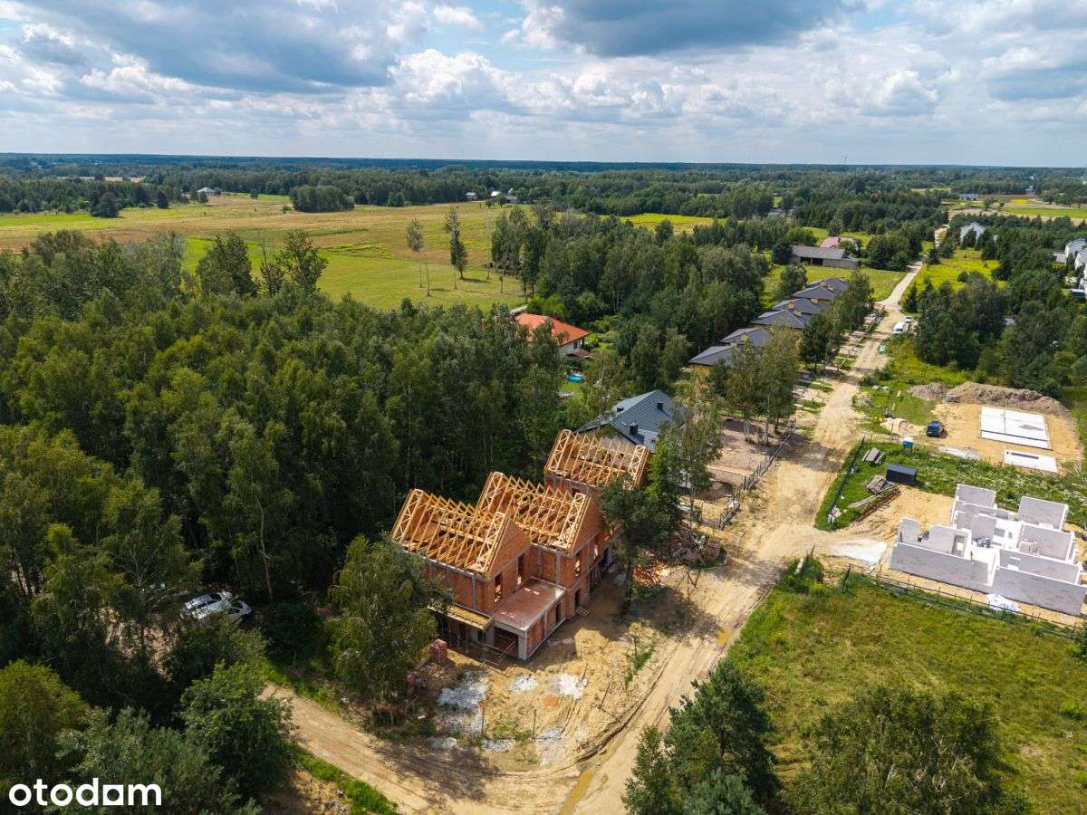 Dom z ogrodem pod Warszawą – nowoczesna inwestycja-9