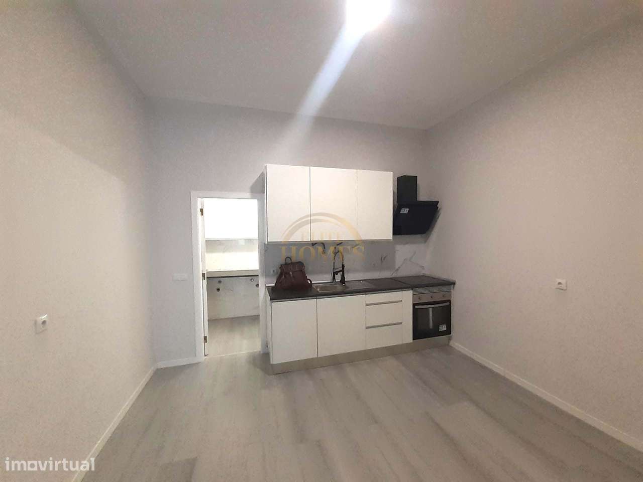 Loja reabilitada com 97m2 para um elegante T1 projectado para oferecer - Grande imagem: 5/22