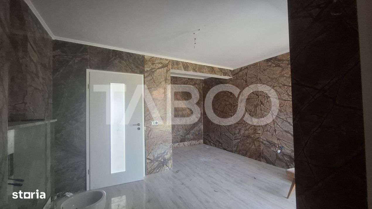 Casa de vanzare 405 mp utili 2 garaje 250 mp terase Slimnic Sibiu - Imagine principală: 4/19