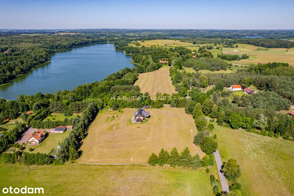 Dom z potencjałem w otoczeniu jeziora i lasu-14