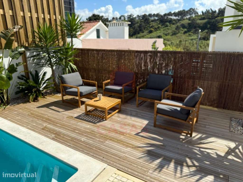 Moradia de arquitectura moderna com piscina privada-7