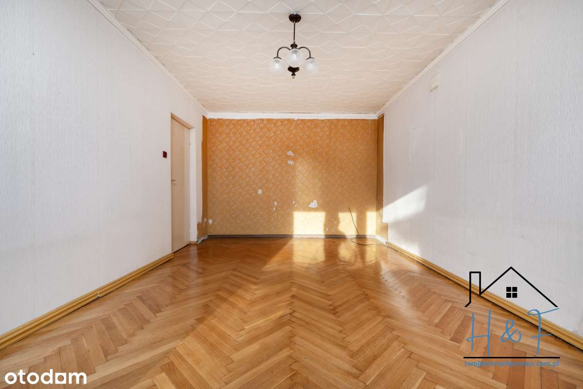 Dom z potencjałem, kawalerką i 2 garażami-1