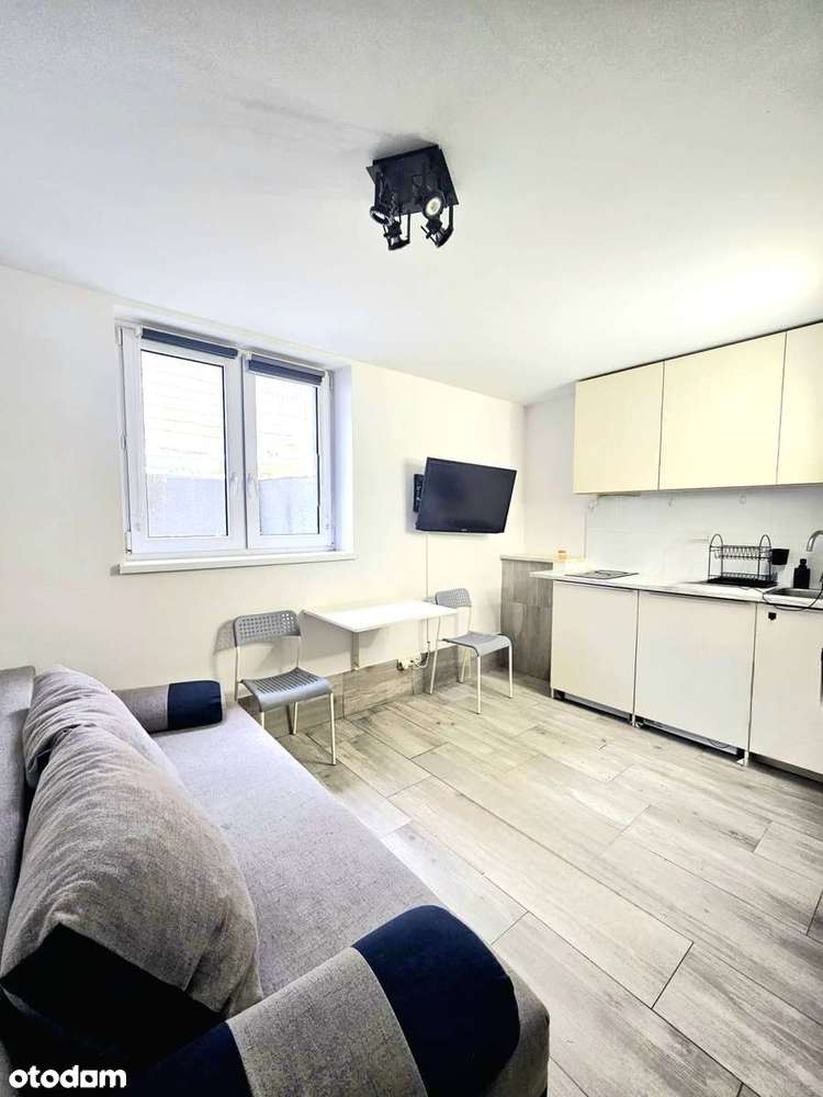 Garsoniera w suterenie z miejscem postojowym-3