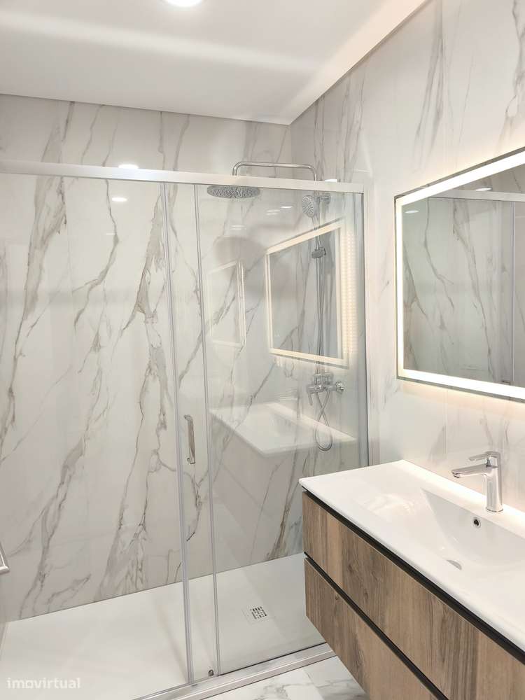 Apartamento T4 Novo c/ Garagem e um parque de Estacionamento-10