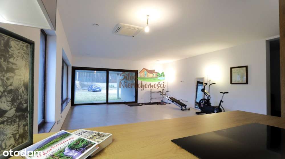 Nowoczesny dom z podwójnym garażem.-0