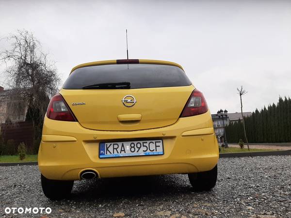 Opel Corsa 1.2 16V Cosmo - 34