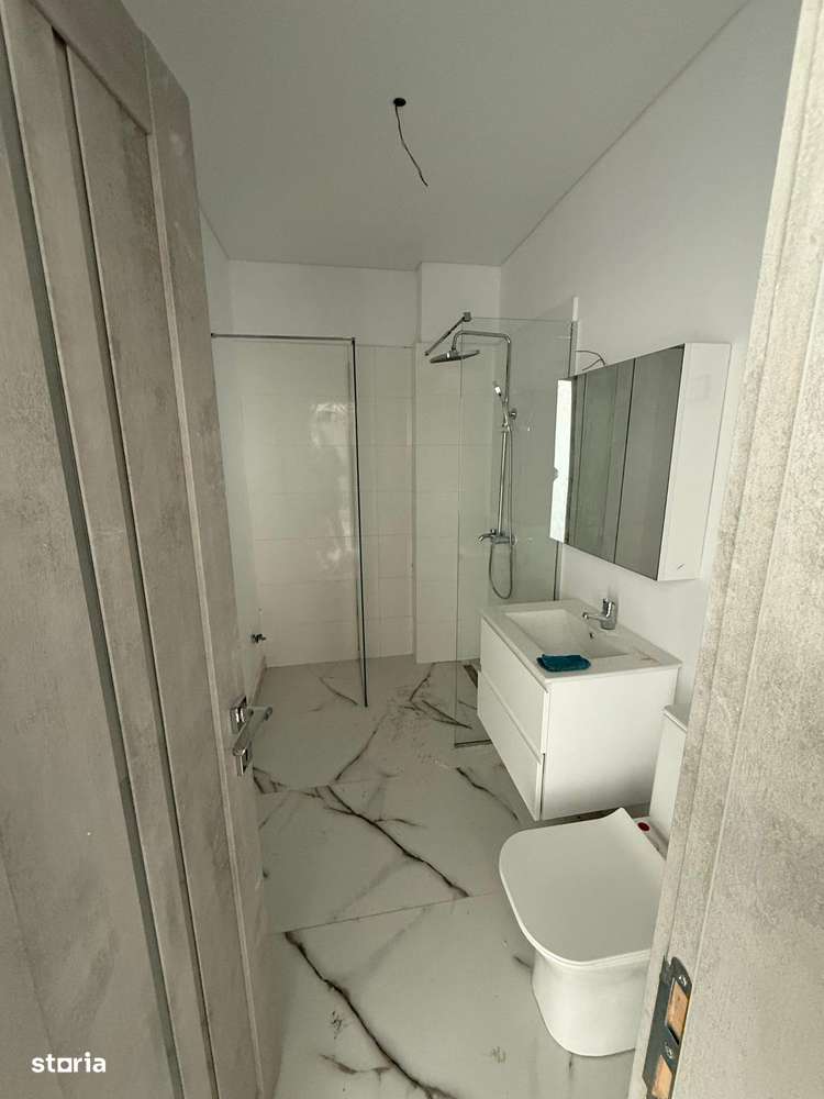 apartament 2 camere spatios studio cu centrala finalizat nou - Imagine principală: 4/11
