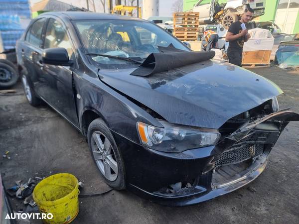 Haion cu luneta Mitsubishi Lancer X  [din 2007 pana  2011] - 7