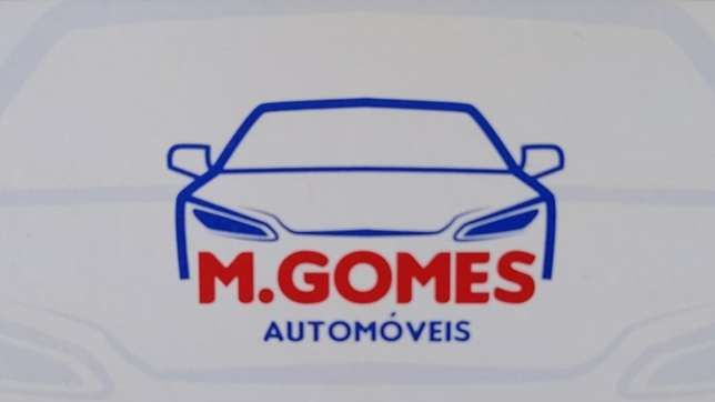 M GOMES Automóveis logo