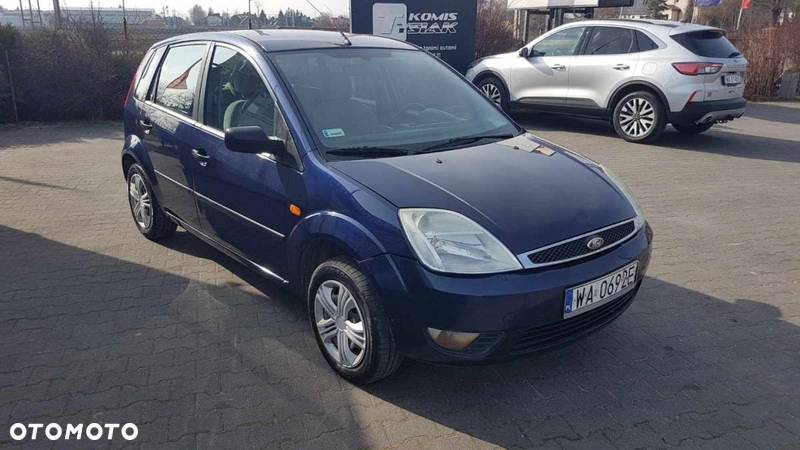 Ford Fiesta 1.4 Ghia - 4