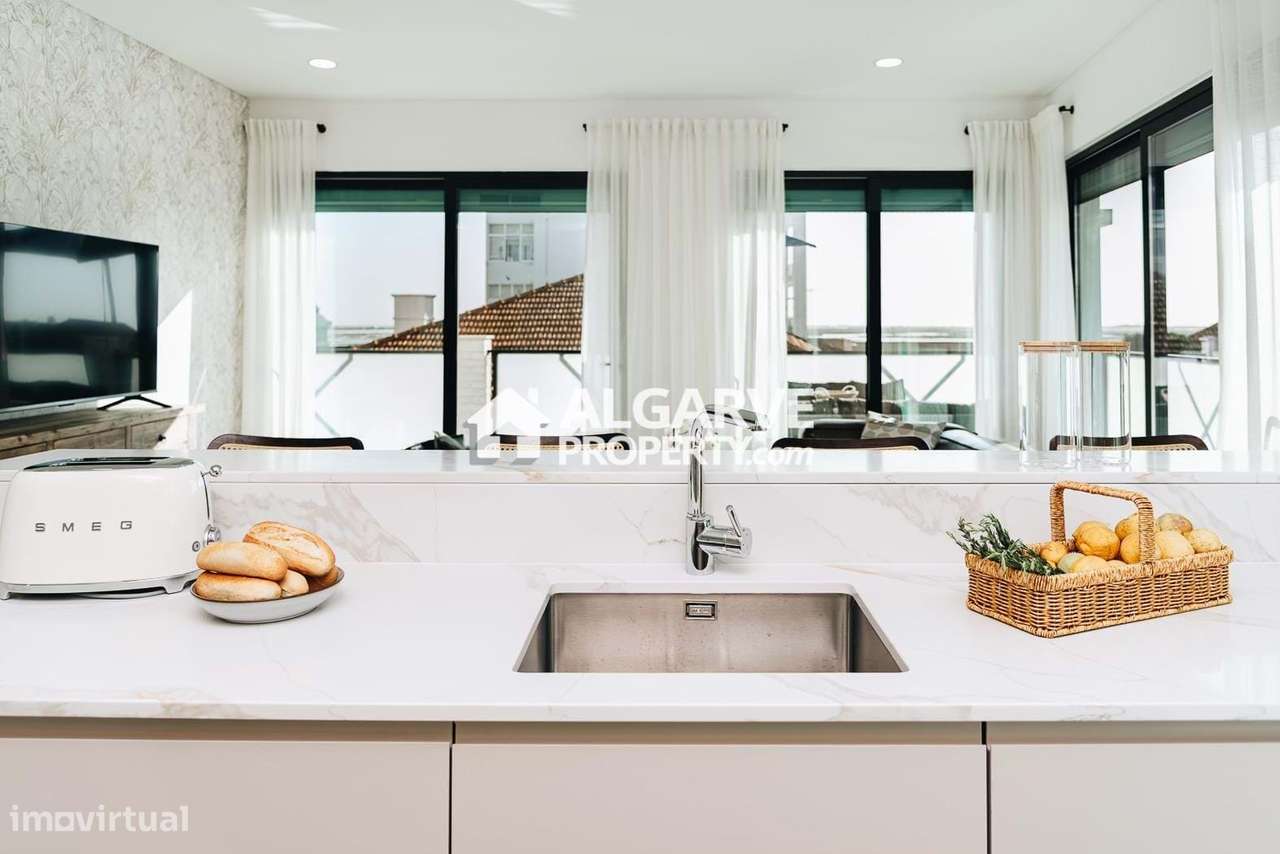 Moderno T2 no Centro de Faro com Garagem e Excelentes Acessos - Grande imagem: 3/27