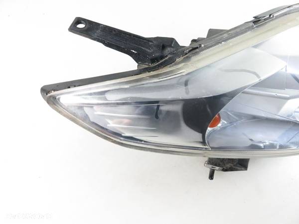 LAMPA PRAWA PRZEDNIA MAZDA 5 XENON P4998 W3T15671 - 3