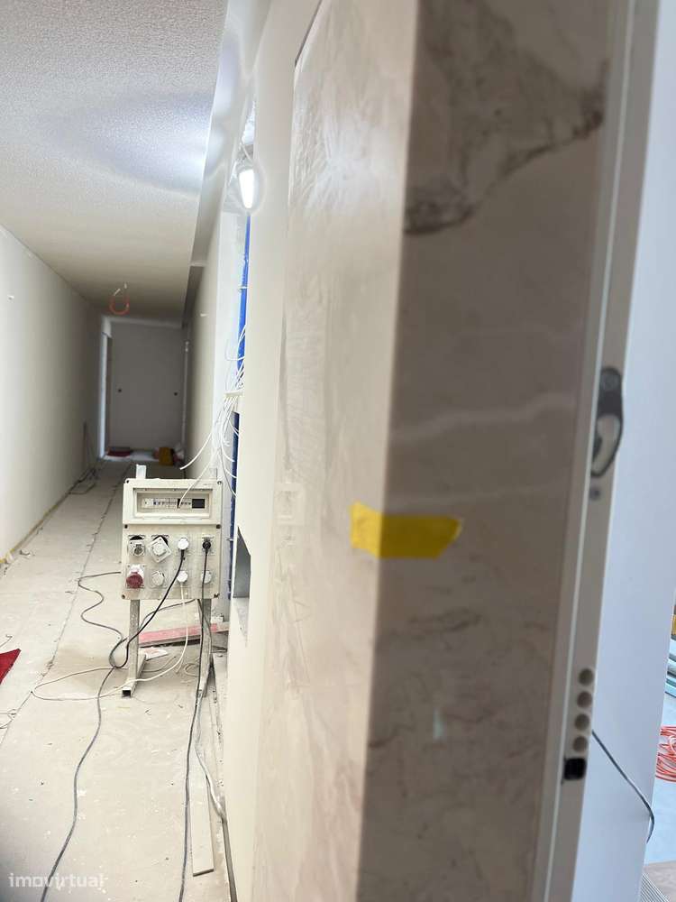 T2 novo com garagem, varanda e ar condicionado-5