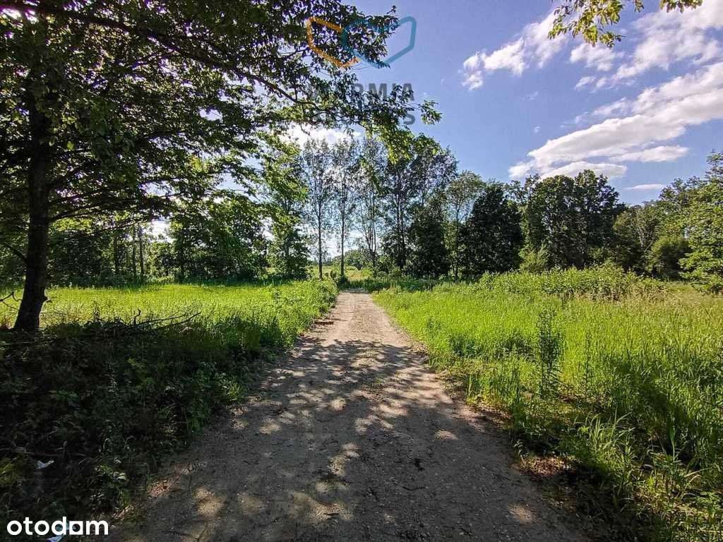 Działka budowlana nad jeziorem z dostępem do plaży-6