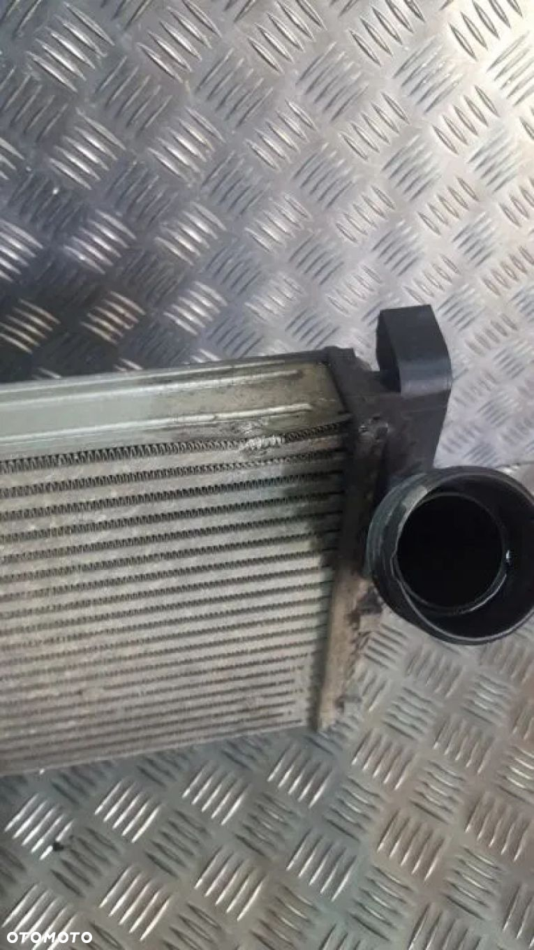 VW TOUAREG 7L 03-06R INTERCOOLER LEWY 2.5 TDI - 2