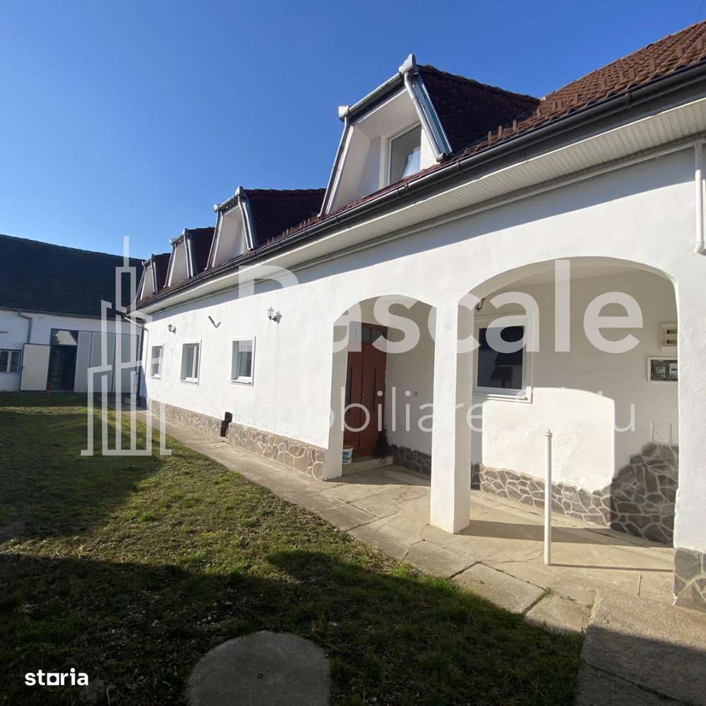 Proprietate versatilă de vânzare – ideală pentru locuință și afacere!-6