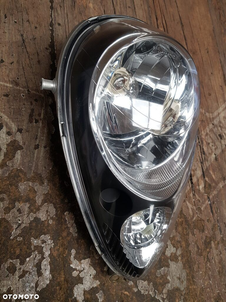 Reflektor lampa Sym Mio 50 - 5