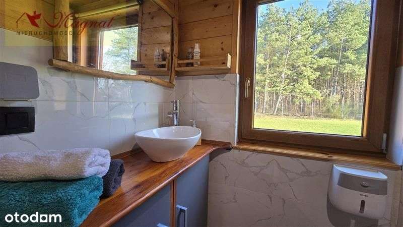 Atrakcyjny dom drewniany całoroczny na dużej dział-18