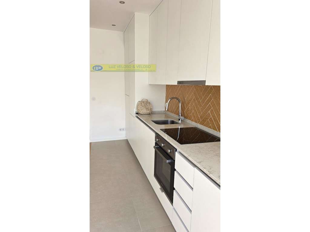 T2 Serra das Minas, remodelado, Arrecadação/Garagem-14