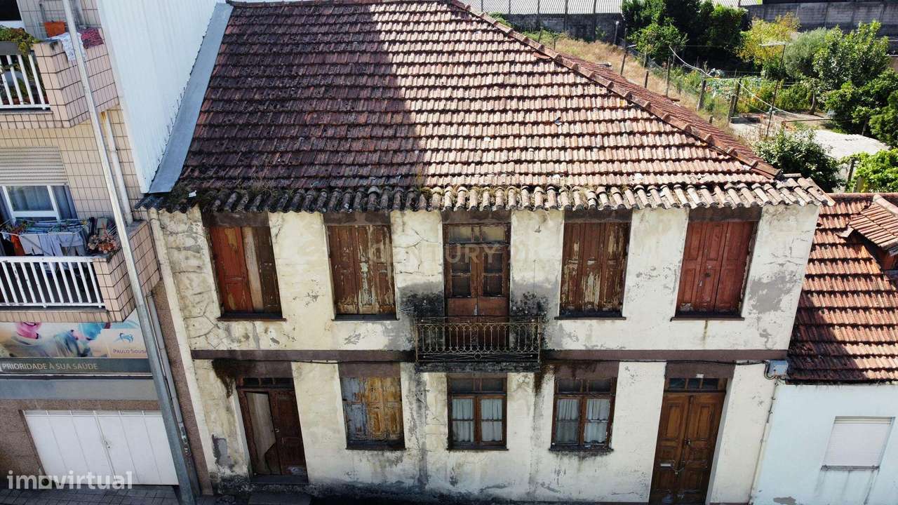 Moradia ancestral com terreno no centro da cidade de Santo Tirso para - Grande imagem: 5/6