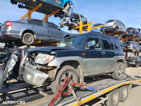 usa portiera stanga dreapta motoras macara geam maner broasca Dezmembrez Mitsubishi Pajero Pinin motor 1.8 benzina dezmembrez - 2