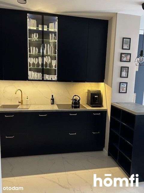 Wyposażone 2-pokojowe mieszkanie z otwartą kuchnią