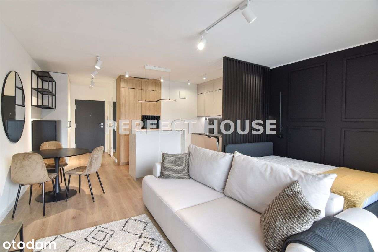 Wygodny apartament z balkonem na Marcelinie