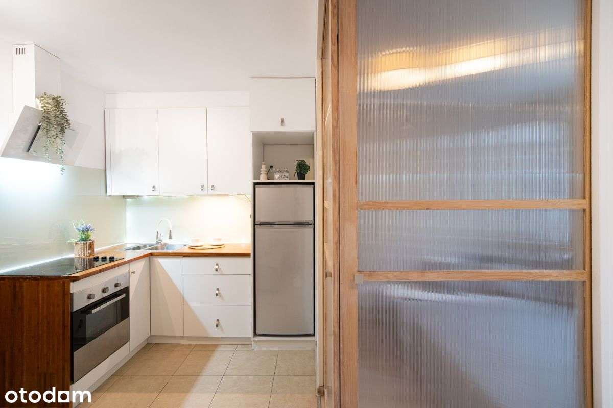 funkcjonalna kawalerka z sypialnią i garderobą!-10