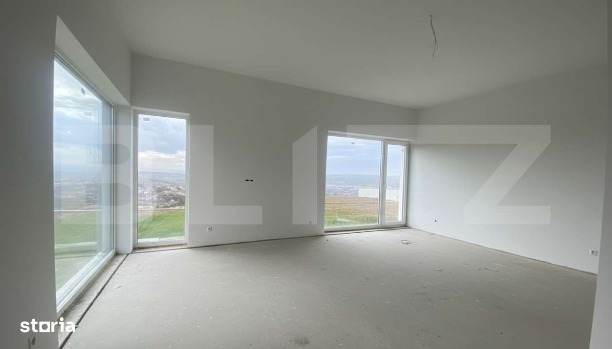 Casa pe calcan cu priveliste deschisa si compartimentare deosebita - Imagine principală: 5/16