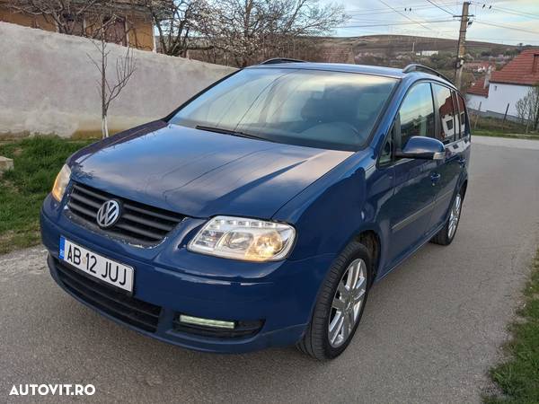 Volkswagen Touran 1.9 TDI Conceptline Aut - 1