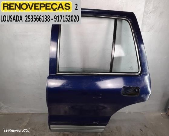 Porta Tras Esq Kia Sportage (K00) - 1