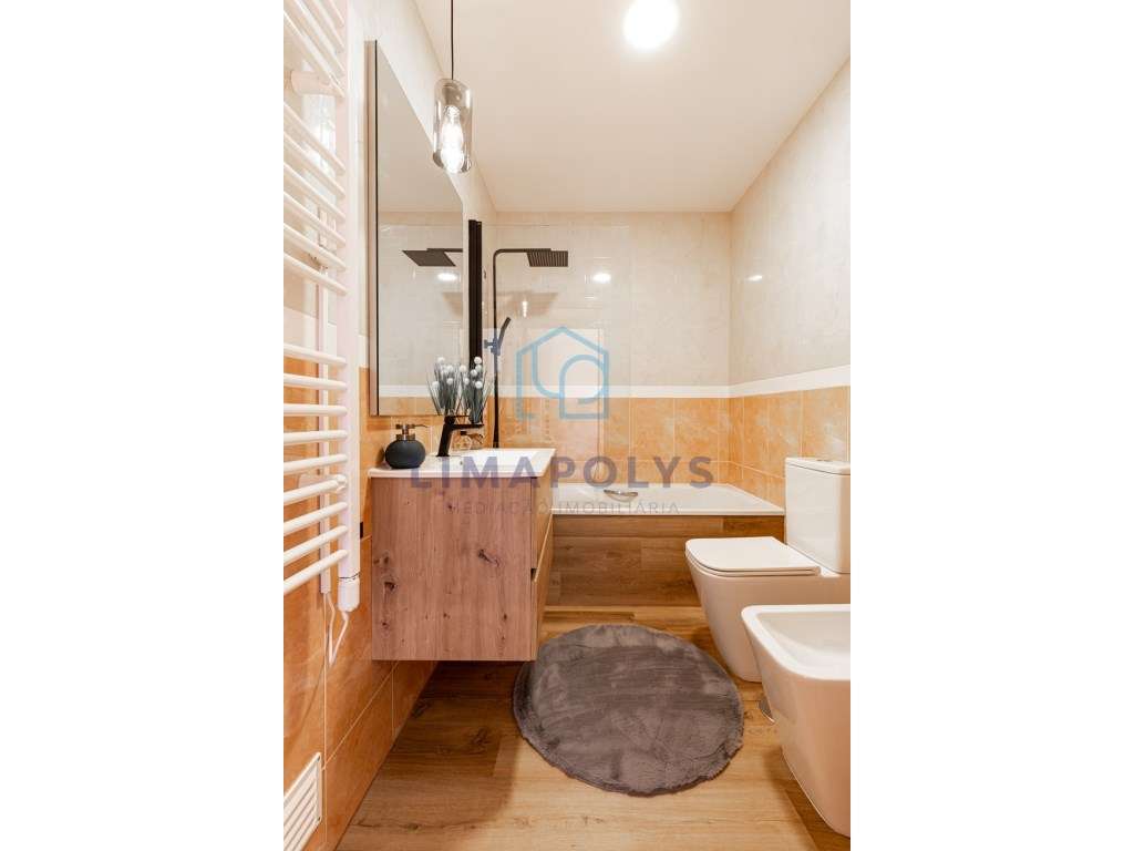 Elegante apartamento T1 renovado com lugar de garagem-15