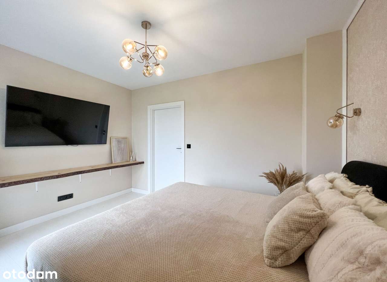 Elegancki dom parterowy z garażem w bryle budynku oraz dużą działką !-15