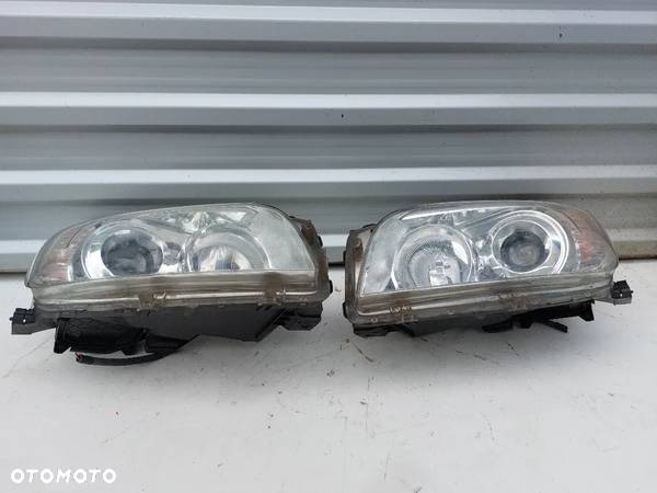 Lampa lewa, prawa przód Toyota Rav4 III - 2